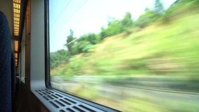 穿越隧道的火车火车行驶窗外风景沿途风光视