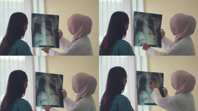 解释肺部x光片医院仪器外国医生X光影像医