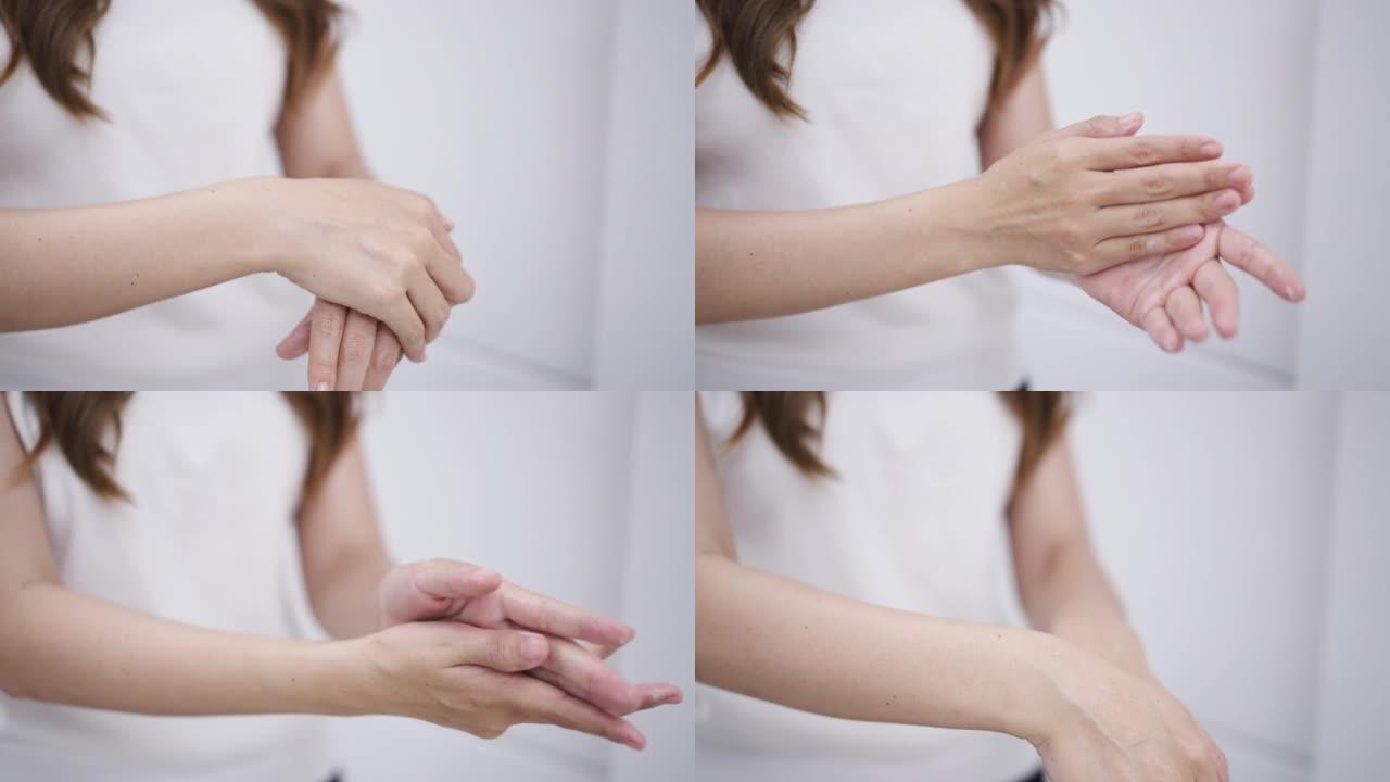 Woman using moisturizer cream on her hands