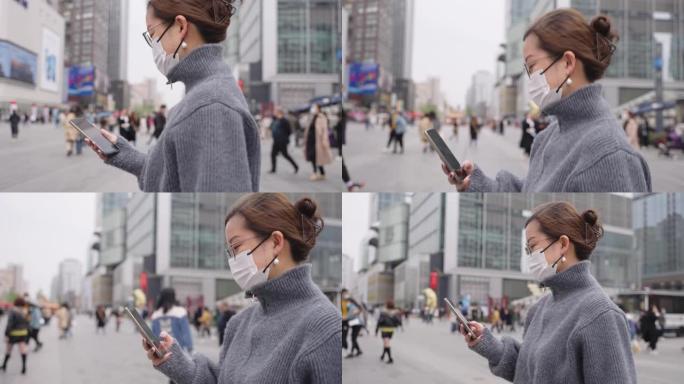 亚洲女子戴口罩行走都市