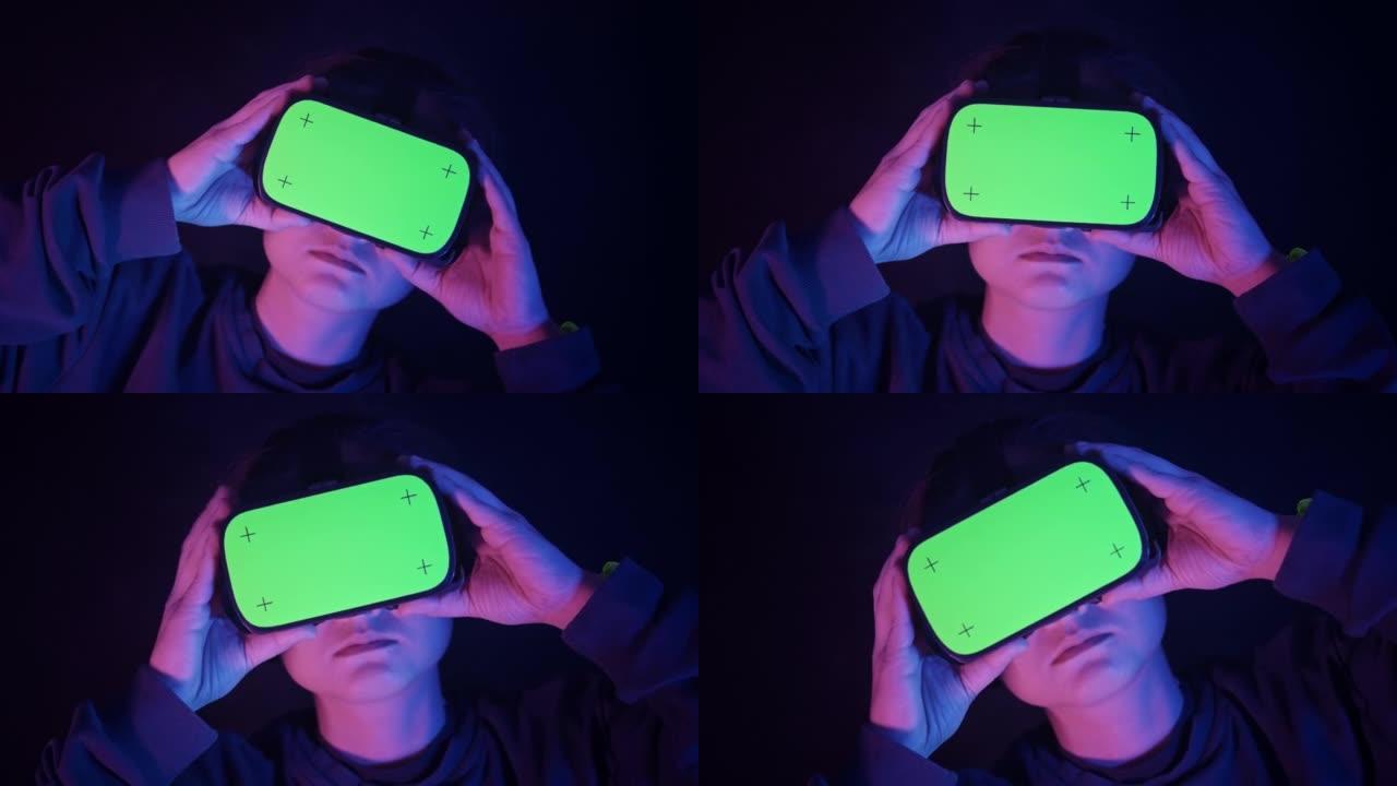 VR耳机上色度键绿屏的女人在家，相机慢慢旋转