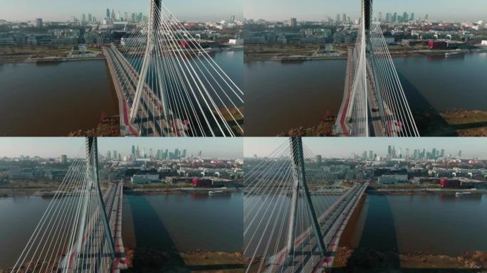 令人惊叹的空中拍摄美丽的现代电缆桥在维斯拉河上，波兰华沙阳光明媚的城市景观天际线。