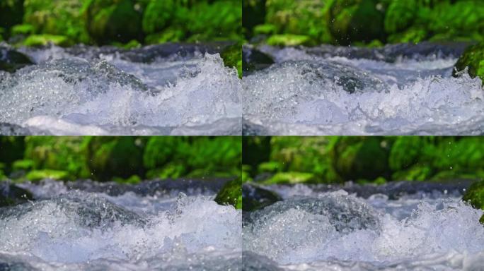 超级SLO MO泉水在河床的瀑布上飞溅