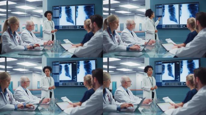 医院会议室: 年轻有前途的黑人女医师在电视屏幕上展示患者的x射线，医生团队讨论治疗方法。研究科学家和
