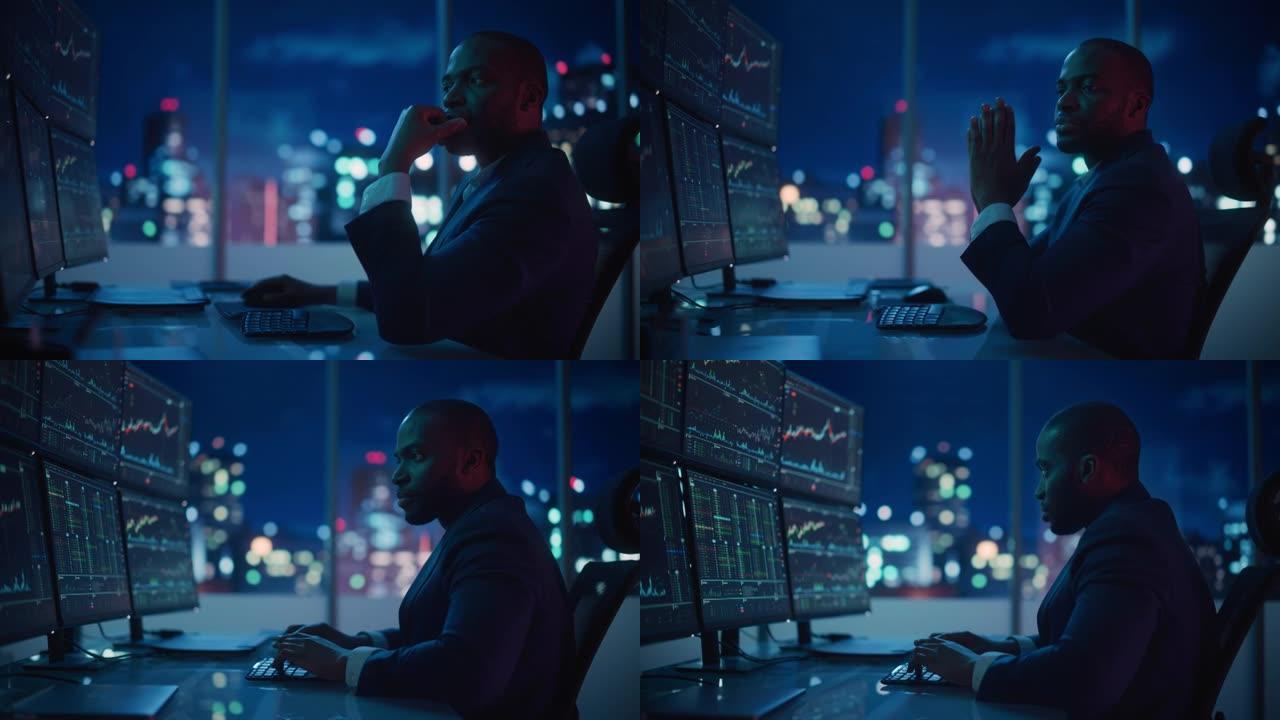 金融分析师在计算机上工作，具有实时股票，商品和交易所市场图表的多显示器工作站。非裔美国人交易员深夜在