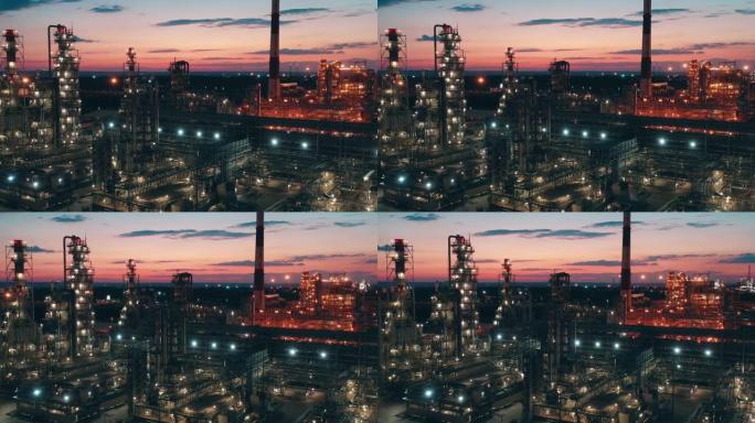 日落时拍摄电灯的炼油厂