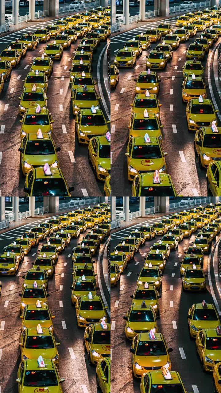 晚上机场出口处的T/L繁忙的出租车排队