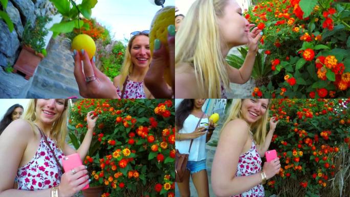 无忧无虑的快乐女人一起度假时发现柠檬树和美丽的花朵
