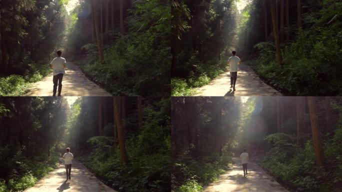 年轻人在森林路上慢跑