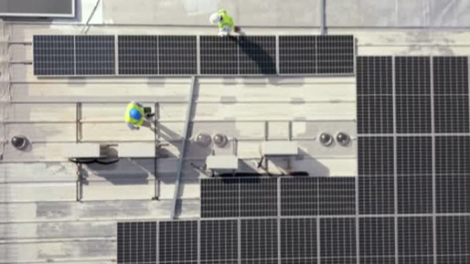 太阳能，无人机或屋顶建筑工程，建筑或能源可持续性。鸟瞰图，太阳能电池板或从事项目管理，城市物流或创新