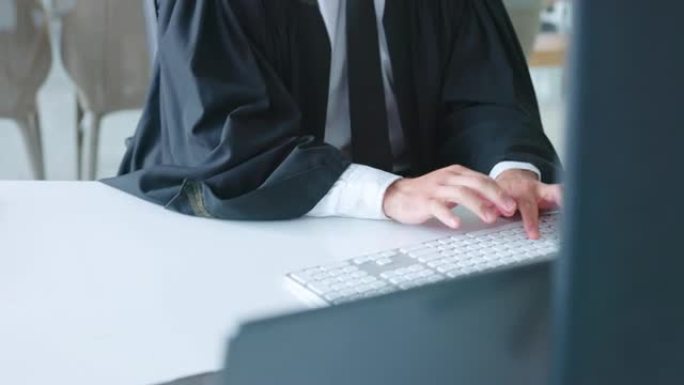 计算机，研究或穆斯林律师在律师事务所中输入电子邮件，合同或建议书以寻求正义。伊斯兰，互联网或专注于办