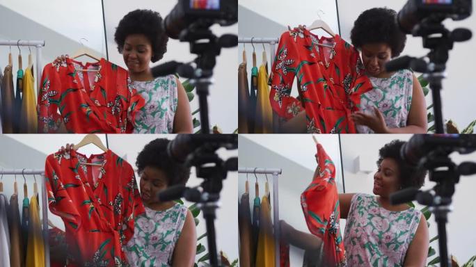 非裔美国女性加大码视频记录器录制一段关于时尚的视频
