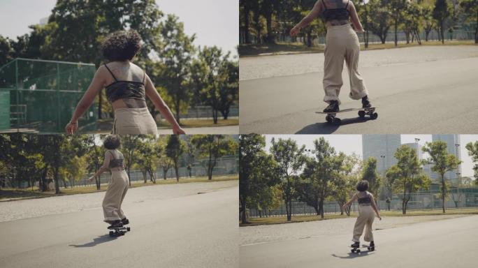 滑板公园里长板的少女。