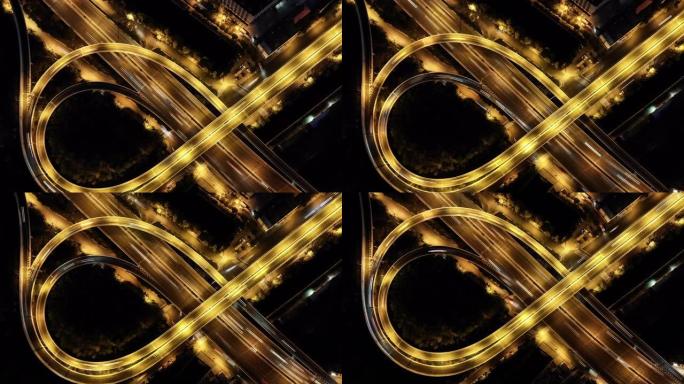 夜间立交桥和城市交通的T/L鸟瞰图