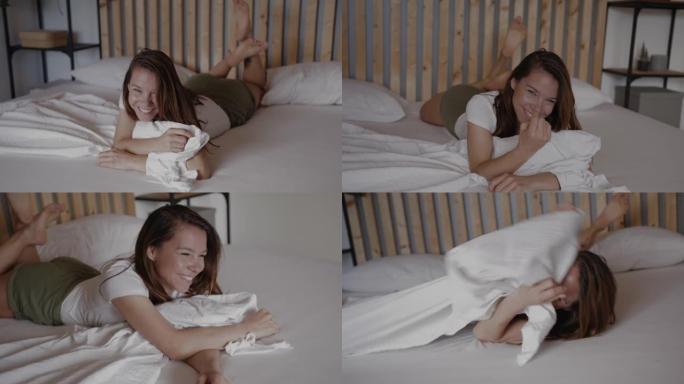 女人躺在床上用手指招手