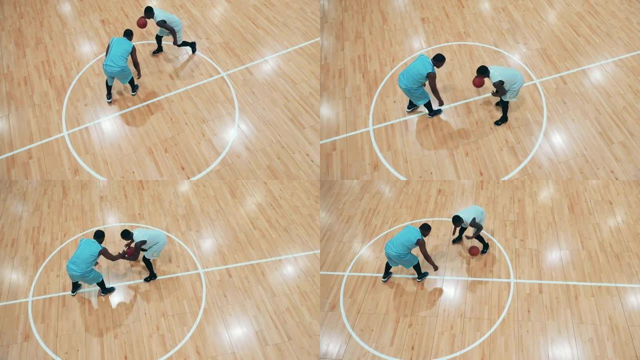 健身房有两名非洲民族篮球运动员练习