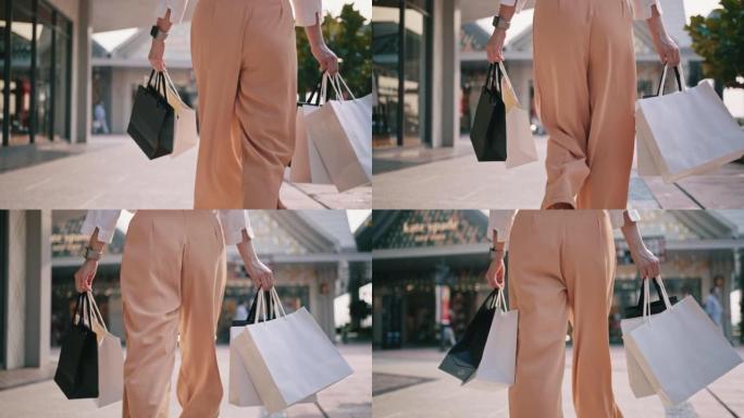 面目全非的女人背着五颜六色的购物袋