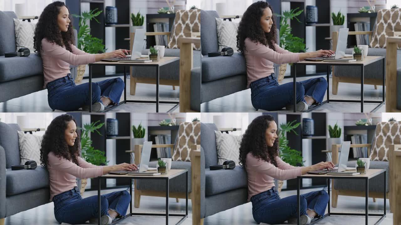 4k视频片段，一位迷人的年轻女子独自坐在家里的客厅里并使用笔记本电脑