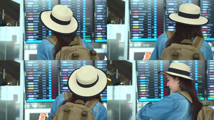 穿着旅游服装的美丽亚洲女人看板关于航班时刻表的信息。出国旅行可以用于代表独自旅行的概念工作中。