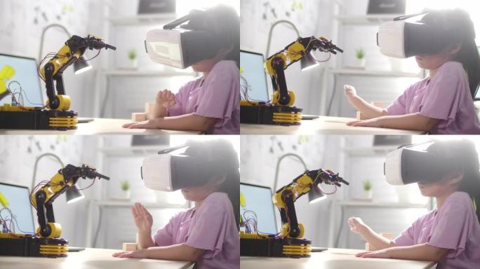 用VR眼镜用手控制机械臂的女孩