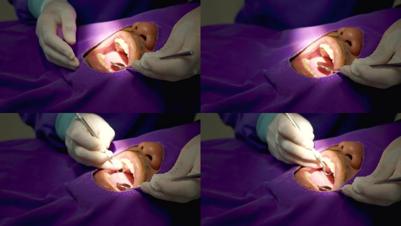 男人和牙医检查牙齿。