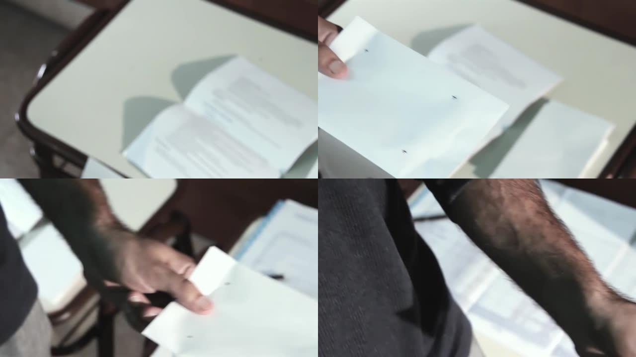 男人手握白色空信封与可定制的FX标记点，而步行在投票中心。特写，4K分辨率。