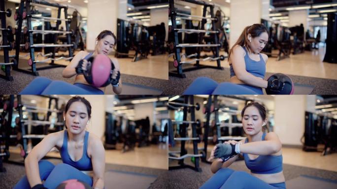 亚洲女性用双抓地力药球锻炼