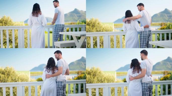 早上与一对夫妇站在风景优美的住宿阳台上，欣赏风景、度假和蜜月。咖啡，自然和旅行与男人和女人一起度假浪