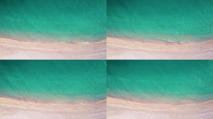 沙滩上有清澈的绿松石水。空中无人机射击。梦想旅行目的地。UHD, 4K