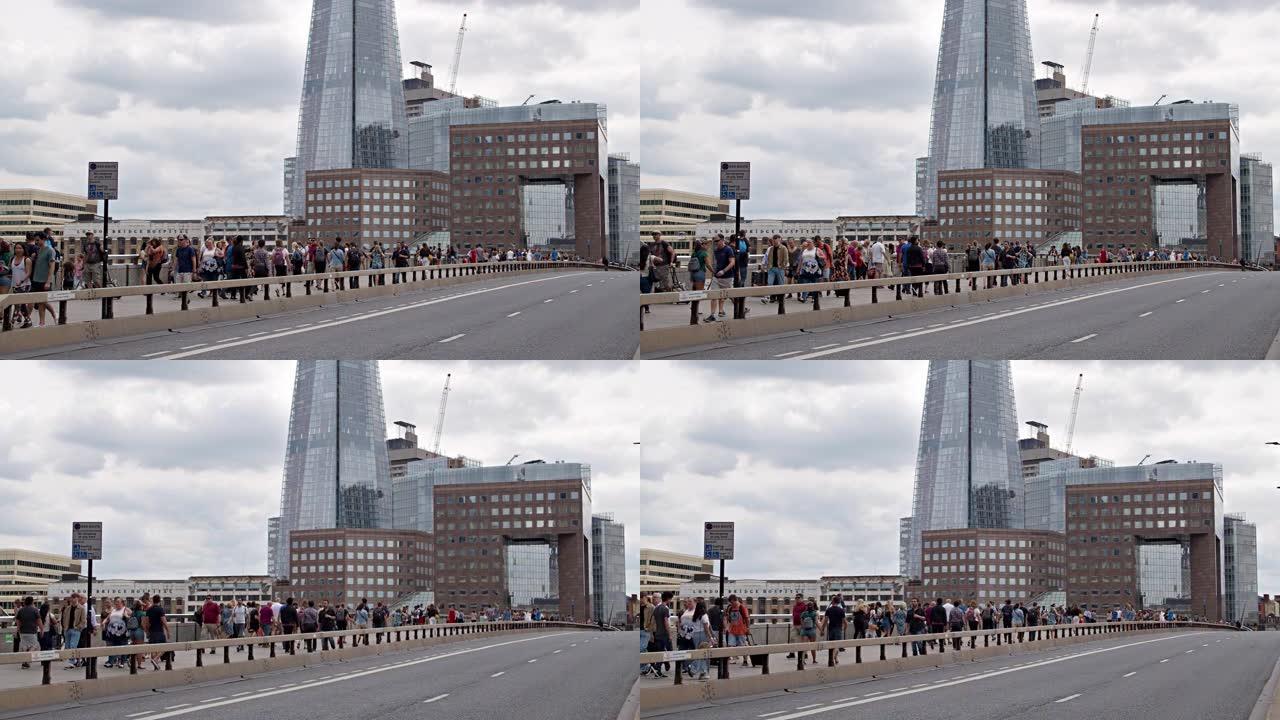 伦敦桥。一群人走到办公室。