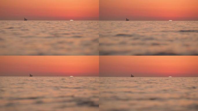 克罗地亚亚得里亚海日落时宁静海洋上的WS剪影船