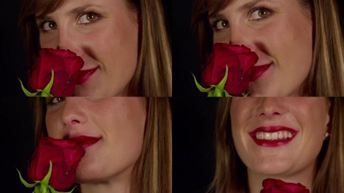 闻着红玫瑰的微笑女人
