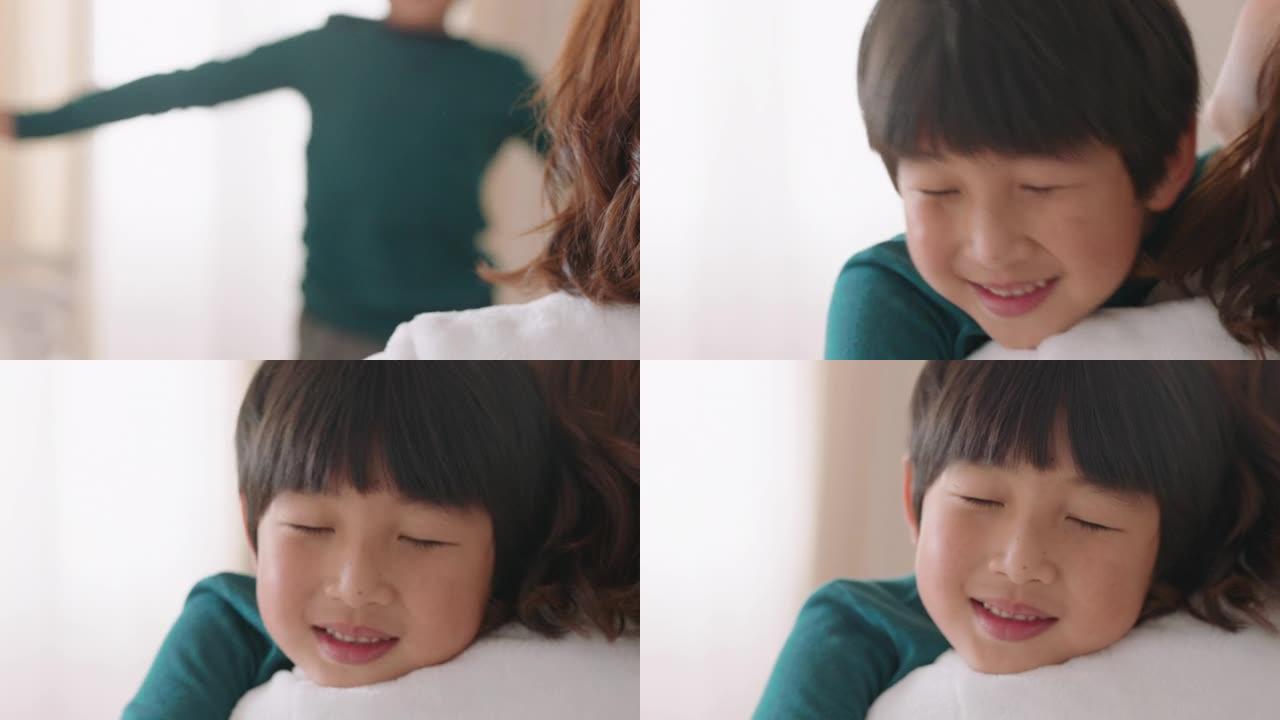 快乐的亚洲小男孩拥抱母亲微笑拥抱儿子享受母爱可爱的孩子给妈妈拥抱家庭概念4k镜头