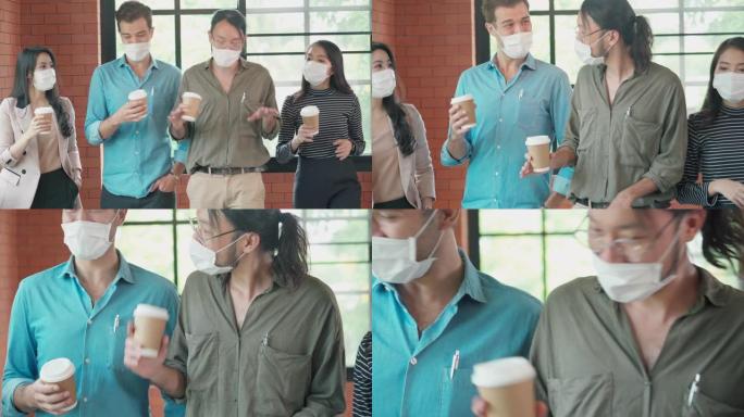 一群办公室工作人员走路和说话戴着口罩在办公室保护新型冠状病毒肺炎
