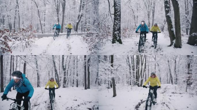 在下雪的冬季小径上与前灯骑行ebikes的情侣
