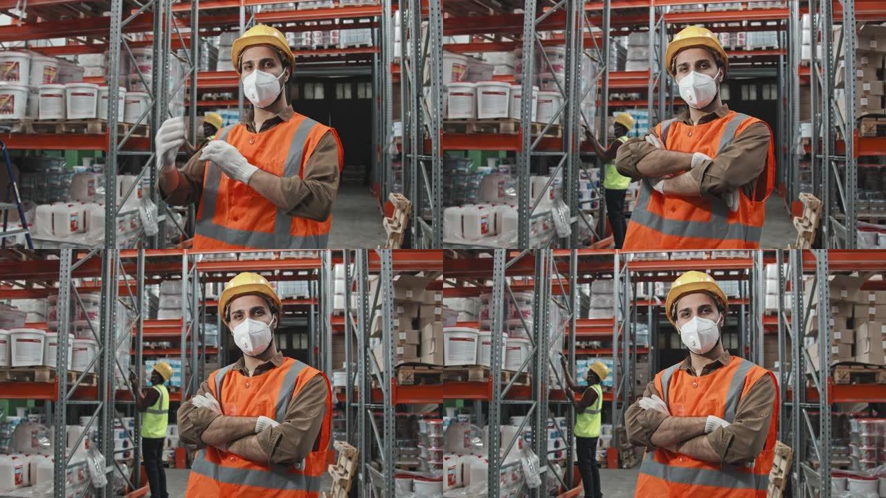 在仓库中假扮面具的男工人肖像