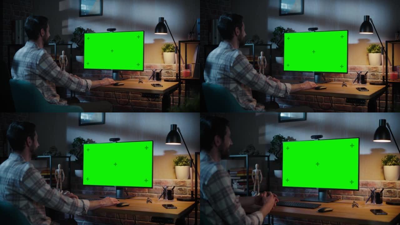 创意专家在家用客厅的台式计算机上通过带绿屏模拟的显示器进行视频通话聊天。自由职业者在社交网络会议应用