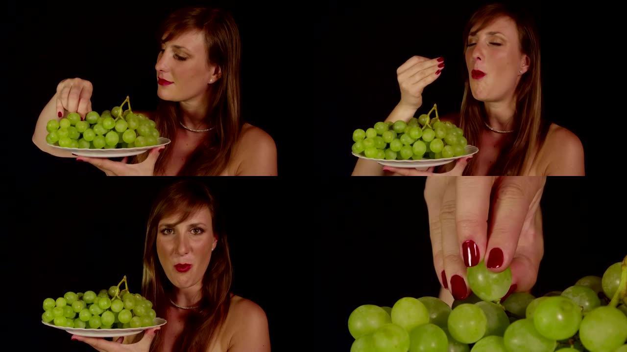吃绿色葡萄的年轻女子
