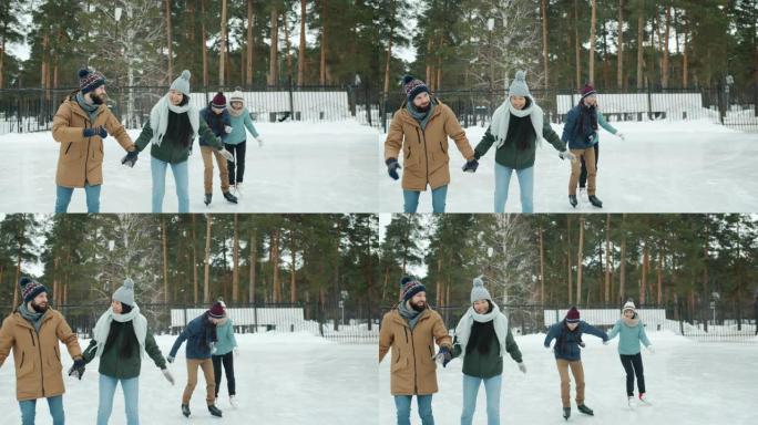 快乐的情侣滑冰聊天笑着享受冬季公园的户外约会
