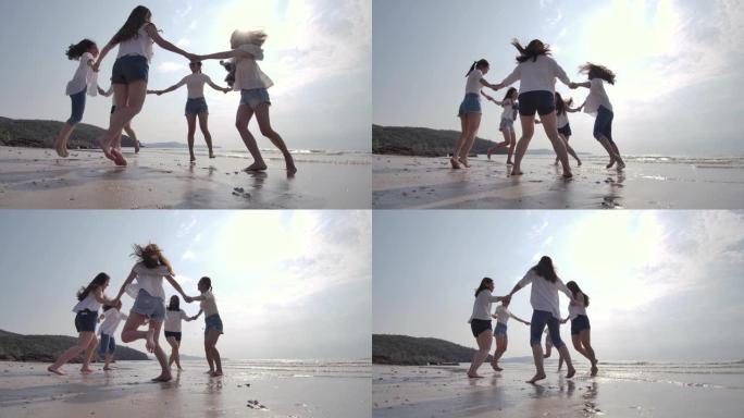 一群朋友的女人在海滩上玩