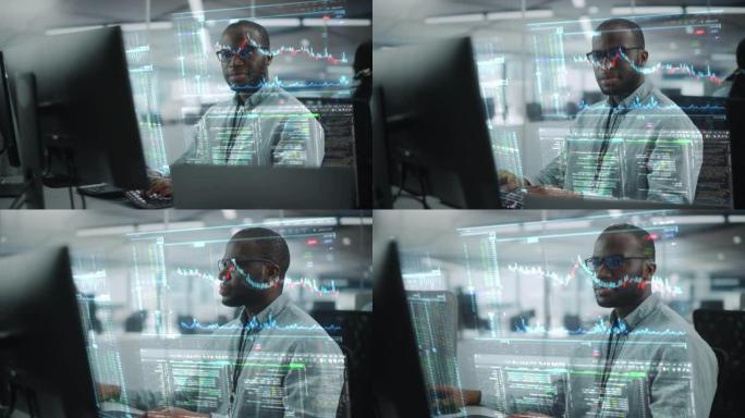 具有全息图屏幕概念的未来派办公室: 专业的黑色IT专家在台式计算机上工作的肖像，带有全息投影，显示股