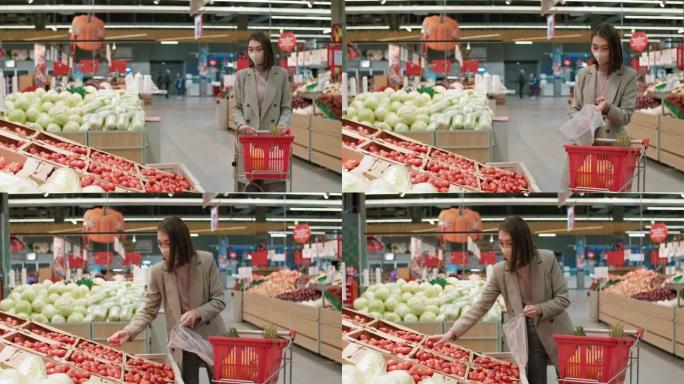 女人在超市选择蔬菜