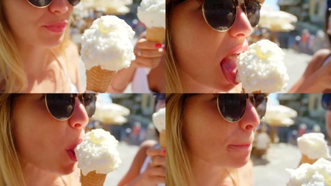 一名年轻女子在意大利度假时与朋友一起享用冰淇淋蛋卷
