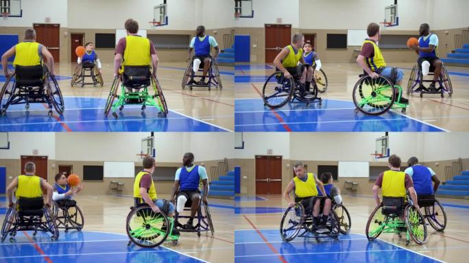 四名男子打轮椅篮球，传球