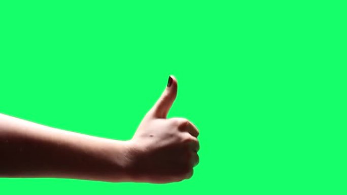 女性的手显示拇指向下和向上在色度背景。