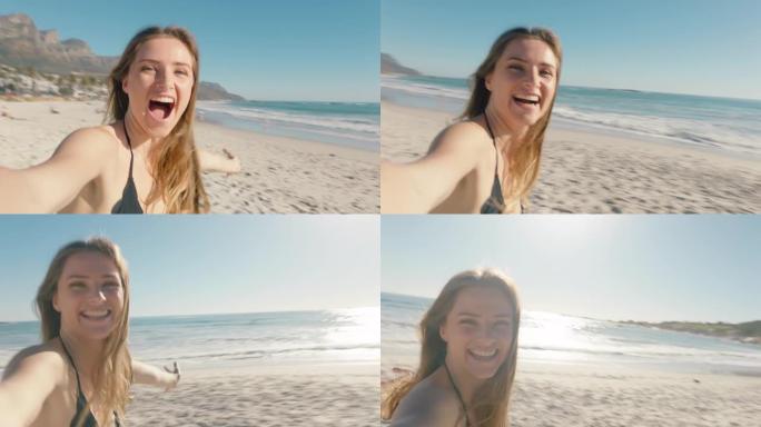 美丽的女人在海滩上视频聊天女孩分享暑假用智能手机相机展示旅行冒险享受快乐的假期体验