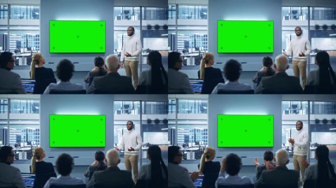 现代产品展示活动: 黑人商人讲话，使用绿色色度键屏幕墙壁电视。面向不同多民族投资者、数字企业家、商人
