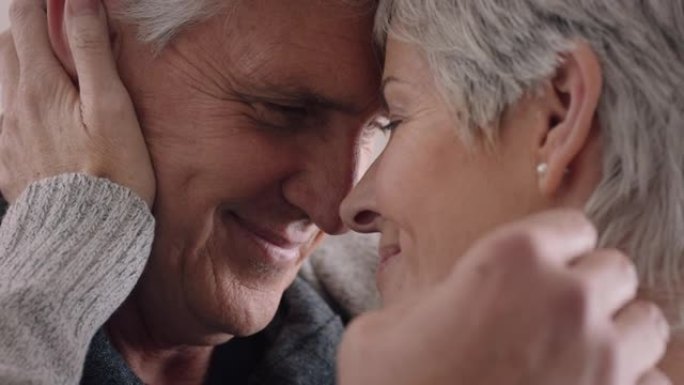 幸福的成熟夫妇拥抱分享浪漫的联系享受长期的关系拥抱一起退休4k镜头