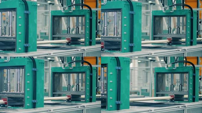 工厂机器正在制造玻璃纤维框架
