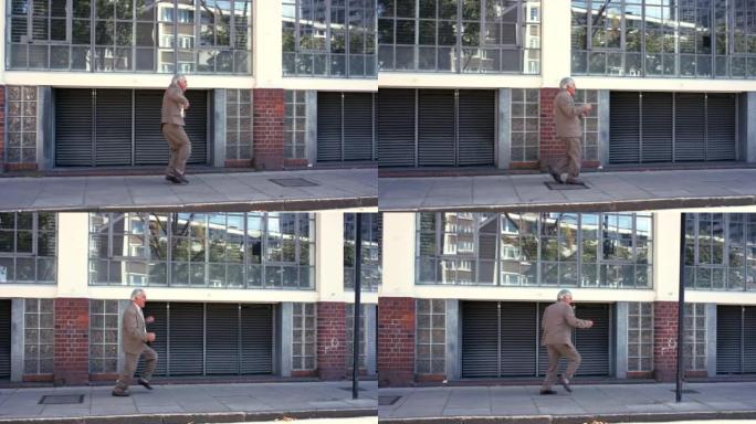 4k视频片段，一名高级男子在城市背景下跳舞